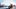 Frau steht auf Hochhaus und freut sich - Foto: tihomir todorov/iStock