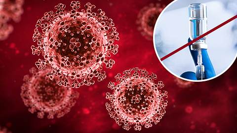 Coronaviren in Rot; durchgestrichene Abbildung einer Ampulle mit Spritze - Foto: istock / ﻿peterschreiber.media, Alernon77